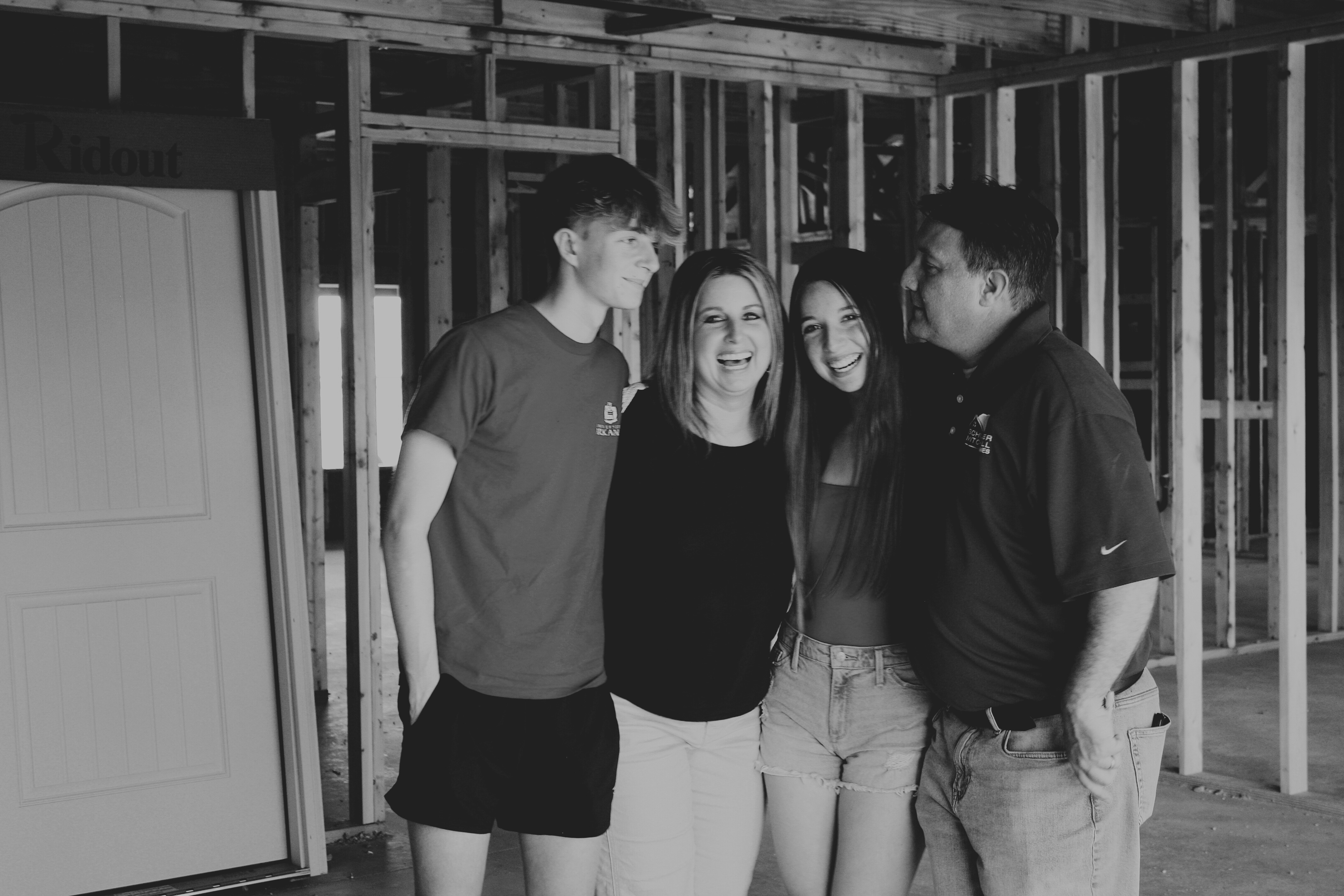 Families expereincing joy after frame dedication